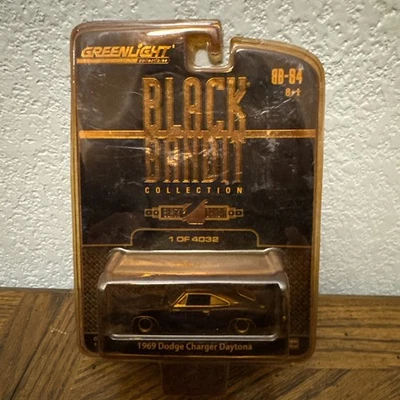 Dodge Charger Daytona 1969 Greenlight Collectibles S4 Black Bandit 1/4032 con RR Foto 1 de 4