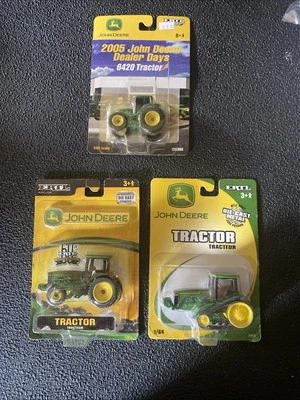 ERTL 1:64 John Deere Tractor Lot Of 3 NIP 2004 & 2005 - Image 1 of 2