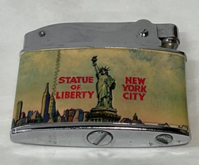 Vintage NYC souvenir fliptop advertising lighter #21 Statue of Liberty  Big Appl - Image 1 of 3