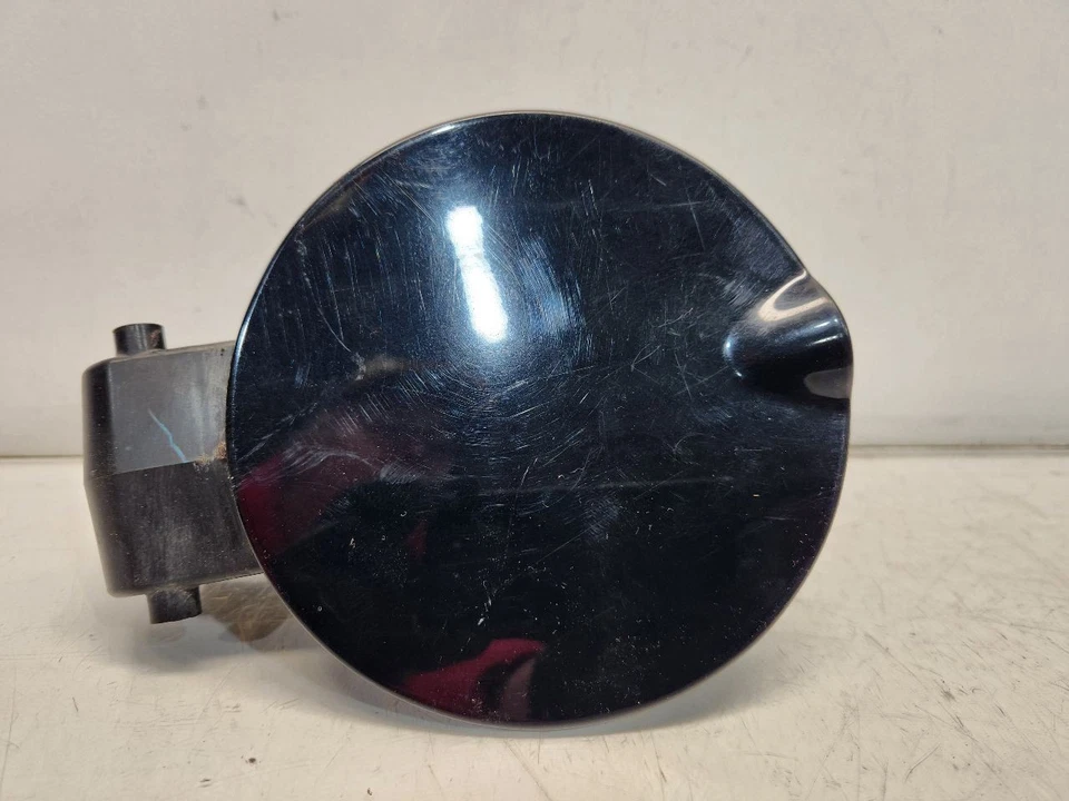 Puerta de llenado de combustible Honda Fit Sport 2007 *negra-B92P* ligeros arañazos Foto 1 de 4