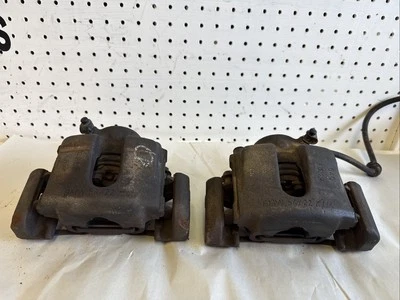 BMW E46 323CI  Front Brake Calipers W/Carrier  OEM - Image 1 of 4