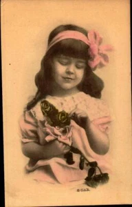 RARE- BEAUTIFUL CHILD WITH ROSES- EARLY 1900's G&B POSTCARD BK74 - Picture 1 of 2