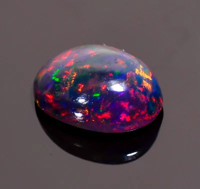 Piedra preciosa suelta cabujón forma ovalada ópalo etíope negro natural 3,5 quilates 13X9X6 mm Foto 1 de 3