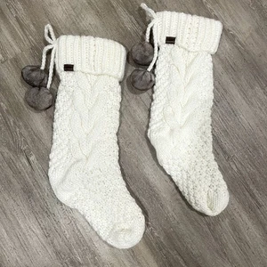 Set Of 2 UGG Classic Ivory Cable Knit Christmas Stocking With Brown Pom Poms - Picture 1 of 8