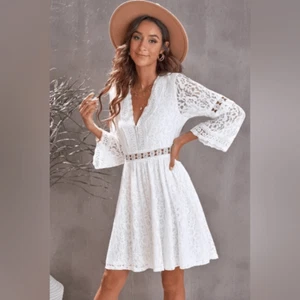 Beautiful Crochet White Lace V Neck Mini Dress With Long Sleeves - Picture 1 of 5