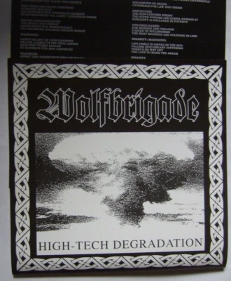 WOLFBRIGADE /  AUDIO KOLLAPS - High-Tech Degradation  & 5 vor 12  Split 7"  mob - Bild 1 von 2