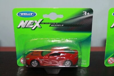 ASTON MARTIN - V12 VANTAGE - 2009 - MODELLINO WELLY SCALA 1/64 - Immagine 1 di 4