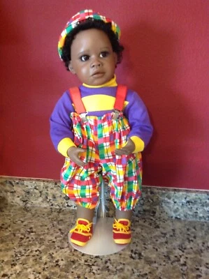 AFRICAN AMERICAN PORCELAIN TODDLER BOY DOLL - Image 1 of 4