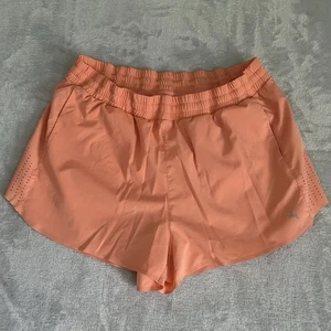 Joy Lab Shorts Damen XL pfirsichrosa integrierter Slip belüftete Taschen Training Laufen - Bild 1 von 12