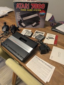 Atari 7800 in original box with, Pole Position and Food Fight