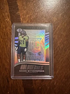 2023 Panini Illusions - HoloHeroes Rookie #13 Devon Witherspoon (RC) - Picture 1 of 2