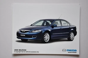 Foto de prensa de coche - Mazda 6 2005 - azul - vista lateral/frontal - Imagen 1 de 1