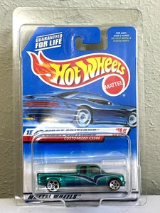 HOT WHEELS CUSTOMIZED CHEVY DUALLY C3500 WITH 5 DOT WHEELS ON CARD IN PROTECTOR - Picture 1 of 3