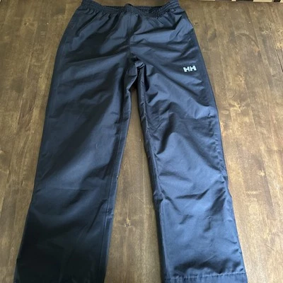 Pantalones Helly Hansen 152/12 negros a prueba de lluvia forro de malla al aire libre caminata acuática activa Foto 1 de 4