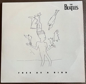 The Beatles “Free as a Bird “ & "Christmas Time" 45 Rpm Apple 1995 (R6422) - Picture 1 of 4