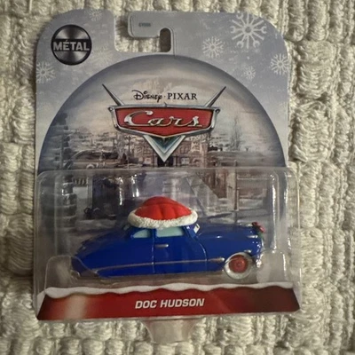 Disney Pixar Cars Doc Hudson Holiday Christmas Santa Hat Metal Diecast 1:55 - Image 1 of 2