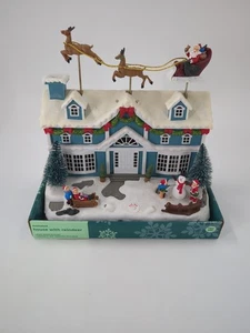 RITEAID In Motion Animated Lighted Musical Christmas House Santa Reindeer  - Picture 1 of 7