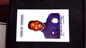 1990-91 Georgetown Hoyas Police #7 Dikembe Mutombo - Picture 1 of 2
