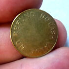 small brass token, eagle one side, no cash value, no refund on other side