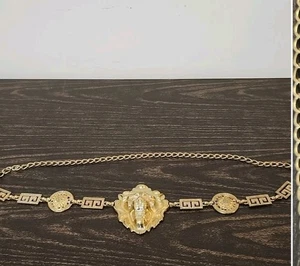 Cinturón medallón cabeza de león tono dorado vintage de metal  - Imagen 1 de 6