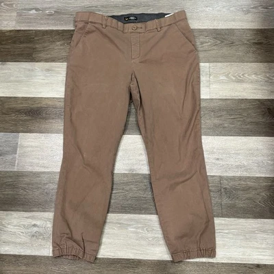 Calça feminina Lee ajuste regular perna cônica cintura média tamanho 16 bronzeada elástica com nervuras VEJA - Imagem 1 de 4