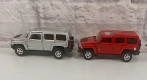 *BRAND NEW* Lot Of 2 Welly Diecast Cars Hummer H3 Red And Silver SUV 4.75 Inch - Picture 1 of 5