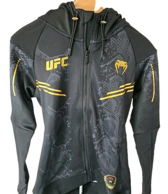Chaqueta con Capucha UFC X Venum Para Mujer Cremallera Completa Talla S Negra Dorada Adrenalina Walkout Foto 1 de 4