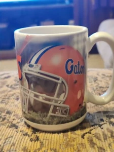Taza de café NCAA University of Florida Gators taza fútbol americano/patrón casco 12 oz - Imagen 1 de 3