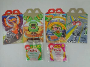 McDonalds Hot Wheels 2x unbenutzte Boxen und 2 Happy Meal Spielzeug ungeöffnet 1995 - Bild 1 von 2