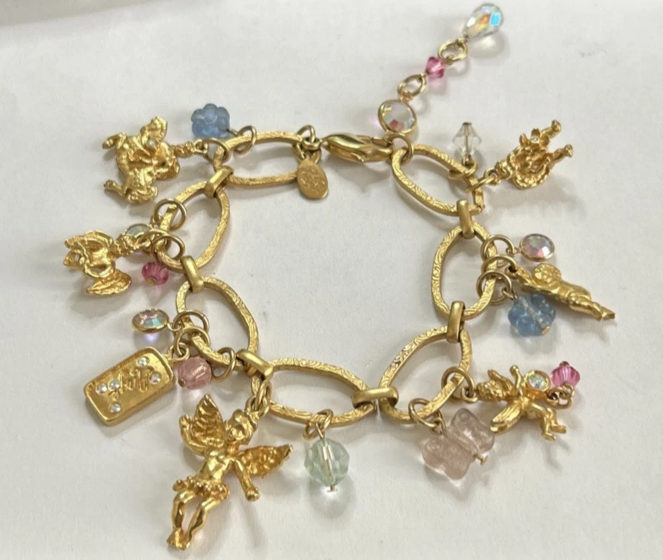 Vintage Kirks Folly Gold Charm Bracelet CHERUBS with Flowers and Butterflies - Image 1 of 4