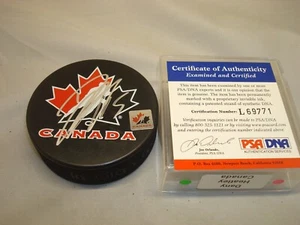 Disco de hockey autografiado por el equipo firmado por Dany Heatley certificado de autenticidad PSA/ADN 1A - Imagen 1 de 3