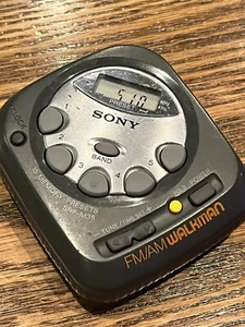 Sony Walkman SRF-M35 FM/AM Stereo Clock Portable Radio W/out  Belt Clip Tested - Picture 1 of 3