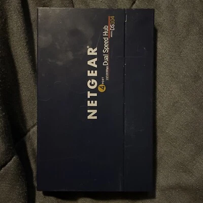 Netgear DS104 10/100 4-Port Dual Speed Hub RJ-45 w/ Uplink Button - Image 1 of 4