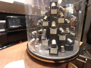 3Y- 35 metal thimbles- w/ rotating covered display case. 1 sterling-many adv. - Picture 1 of 4