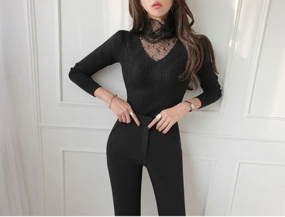 Suéter negro con encaje Foto 1 de 3