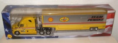 Camión americano Freightliner Cascadia 2020 Team Penske modelo de remolque a escala 1:43 Foto 1 de 2