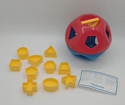 NUEVO Clasificador de formas clásico Tupperware Shape O Ball de colección Foto 1 de 4
