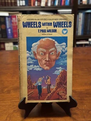WHEELS WITHIN WHEELS by F. Paul Wilson (1ST DELL PRINTING - 1979) PB - Image 1 of 4