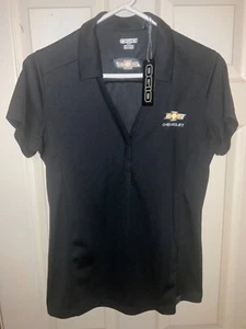 NUEVO POLO DE GOLF OGIO CHEVROLET MOTORS LOGO FIRMA NEGRO PARA MUJER CUELLO EN V (TALLA M) - Imagen 1 de 2