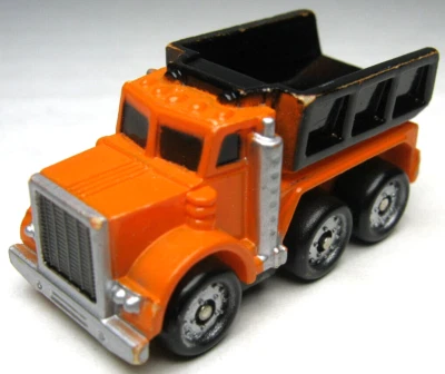 ВИНТАЖНЫЙ СТРОИТЕЛЬНЫЙ САМОСВАЛ 1987 GALOOB MICRO MACHINES ОРАНЖЕВЫЙ С ЧЕРНЫМ - Изображение 1 из 4