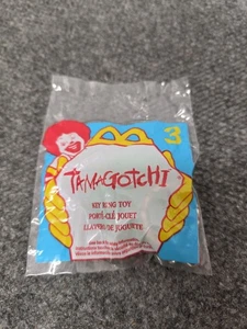 McDonald's Happy Meal giocattolo vintage 1998 Tamagotchi portachiavi giocattolo #3 nuovo - Foto 1 di 1
