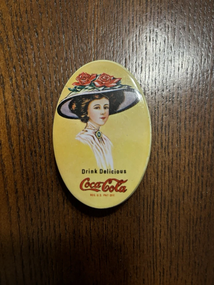 Coca-Cola Vintage Travel Tin Sewing Kit Yellow Oval Box with Graphic Print - Image 1 of 3