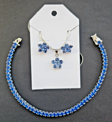 Elegante juego de collar, pulsera y pendiente con diseño de flores con color azul tanzanita Foto 1 de 4