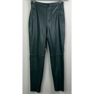 Pantalón para mujer Zara verde imitación cuero vegano cremallera dobladillo cremallera lateral bloggers talla pequeña  Foto 1 de 4