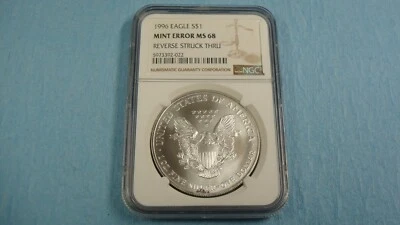 1996 NGC MS 68 MINT ERROR REVERSE STRUCK THRU SILVER EAGLE $1 COIN - Image 1 of 4