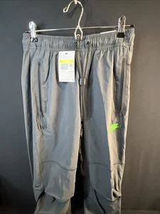 NUEVO $125 NIKE TECH TEJIDO JOGGERS PANTALONES DE ENTRENAMIENTO ANTRACITA/VERDE HM8241-060 Pequeño - Imagen 1 de 10