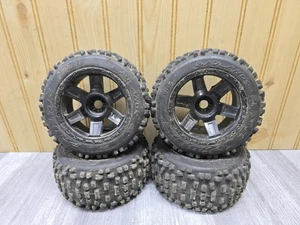 4x Proline Badlands #1178 1/8 Tires on 17mm Hex Wheels Used Traxxas Arrma Losi - Picture 1 of 3