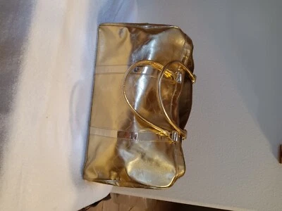 Bolso de Mano/Bolso de Mano BCBG MAX AZRIA Dorado Metálico Cierre con Cremallera para Pasar la Noche Foto 1 de 4