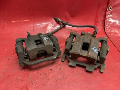 Infiniti M35 2006 tracción trasera derecha e izquierda juego de pares de pinzas de freno OEM #2 Foto 1 de 4