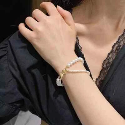 Brazalete de perlas blancas Akoya de diseño bonito de dos hebras 4-5 mm/6-7 mm 7,5-8" 14 kgp Foto 1 de 4